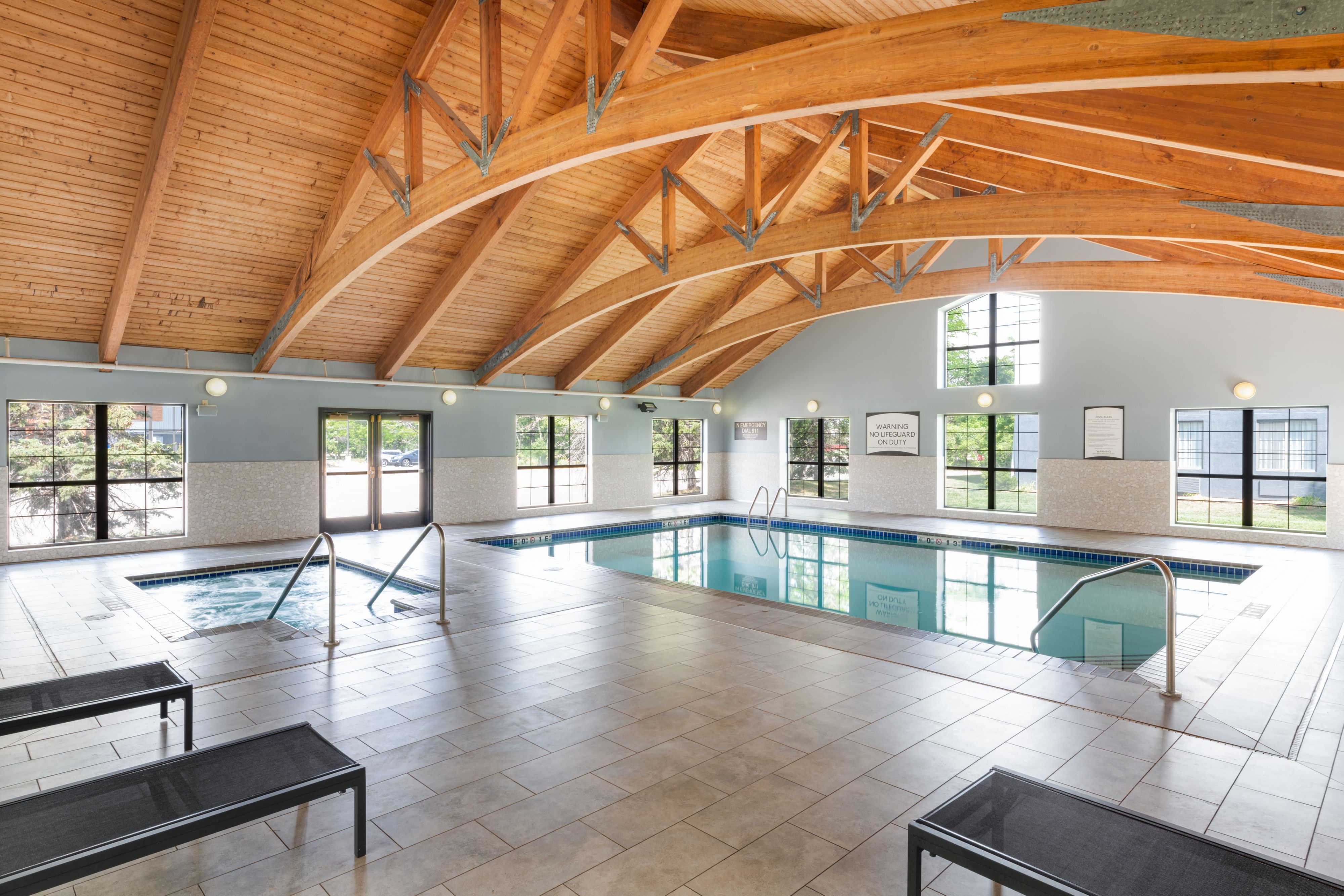 image Swim year-round in the indoor pool beneath soaring wooden beams and floor-to-ceiling windows.