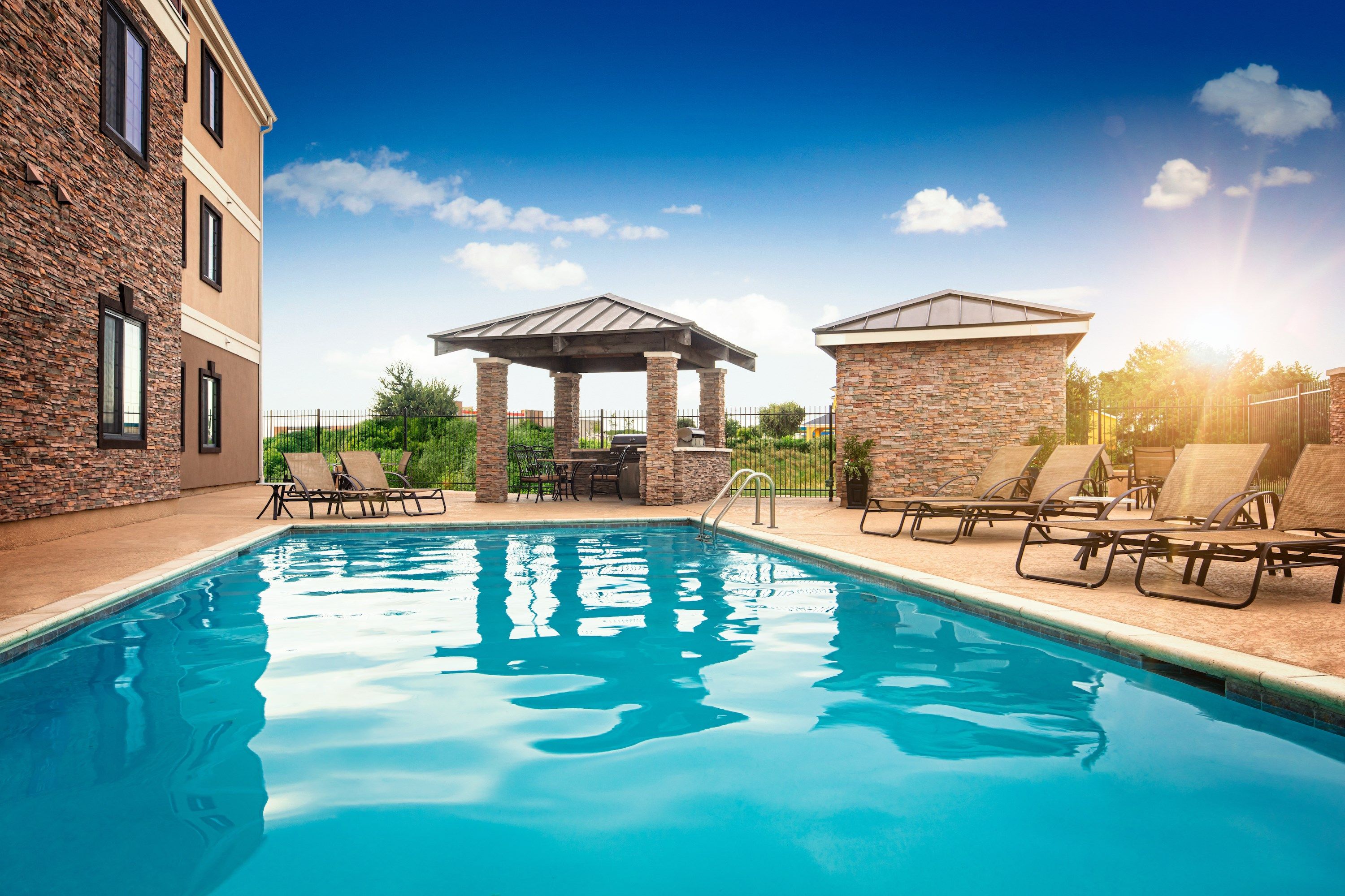 image Take in gorgeous views while lounging around the on-site outdoor pool.