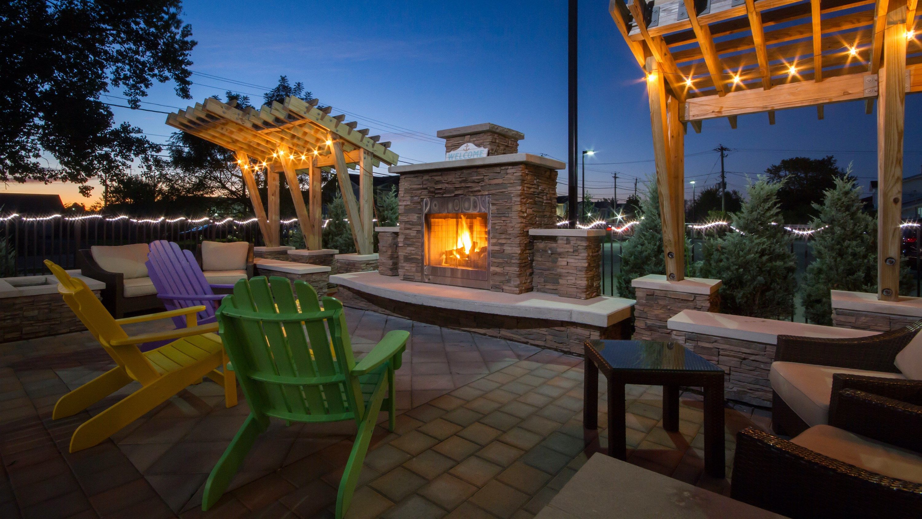 image Outdoor fire pit lounge with comfortable seating
