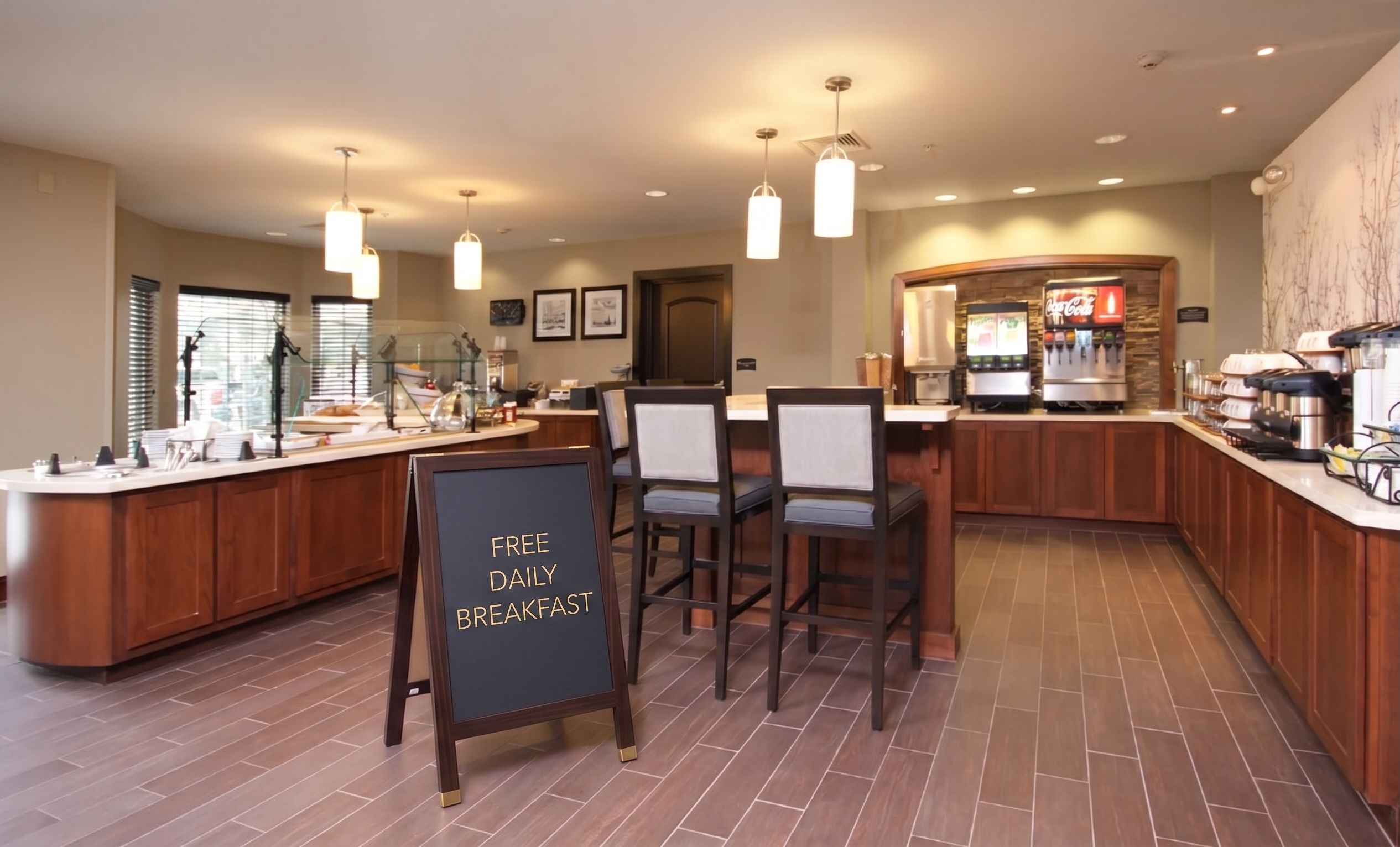 image Bright dining area with free breakfast buffet and seating
