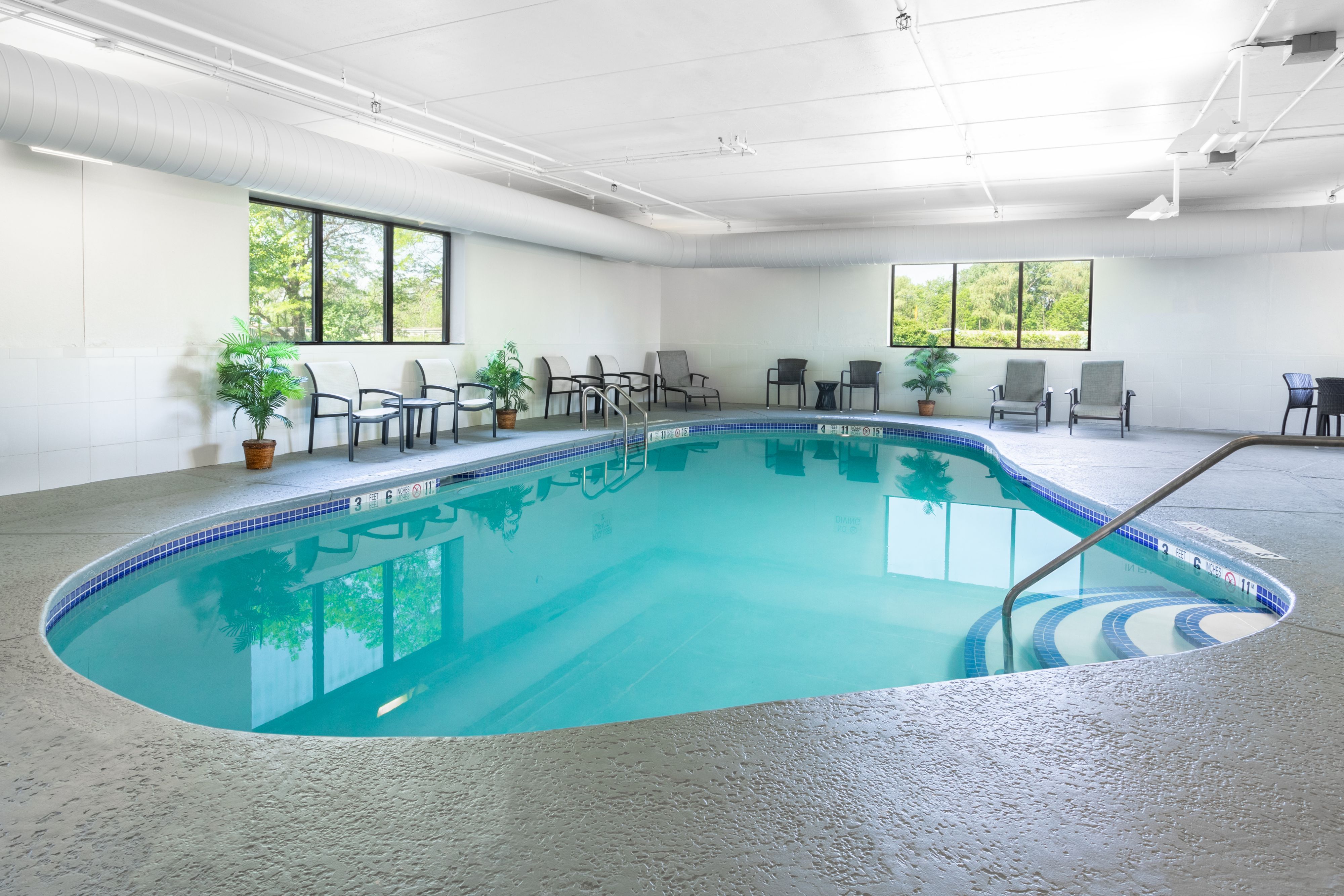 image Inviting indoor pool area with a relaxed atmosphere.
