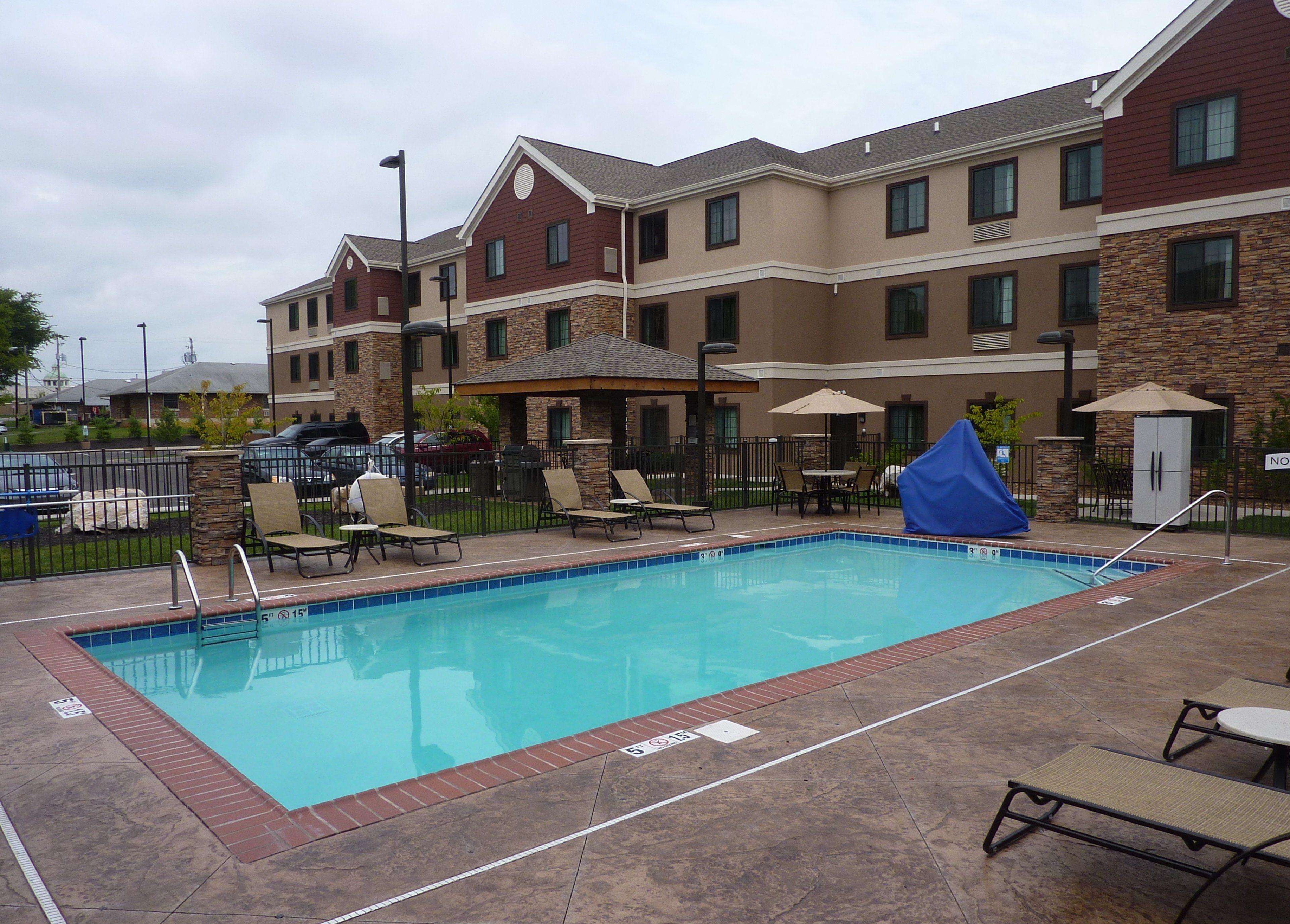 image Heated outdoor pool open daily for guests — a refreshing retreat after a day exploring Bowling Green