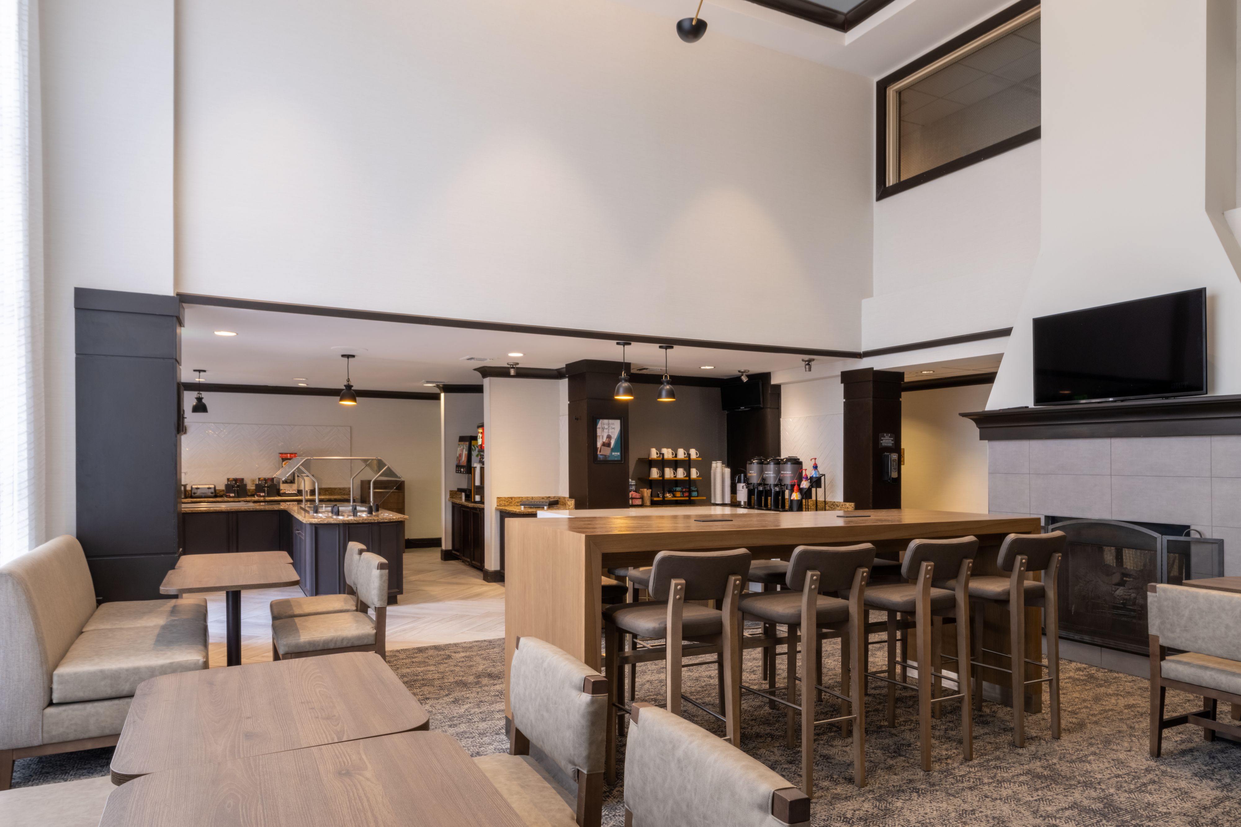 image Complimentary breakfast area with hot and cold selections.