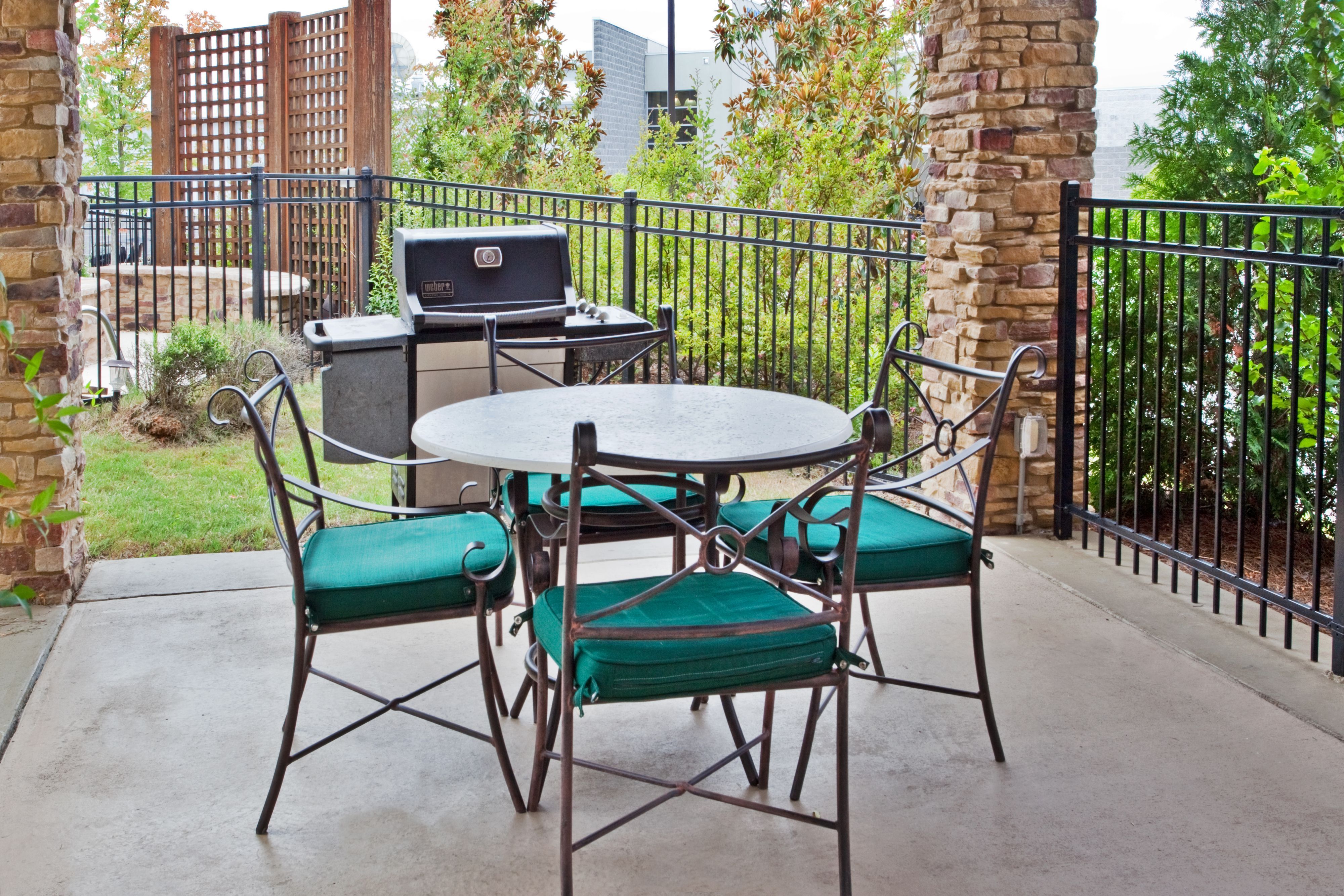 image Fire up the grill for a perfect al fresco dining experience on the patio.