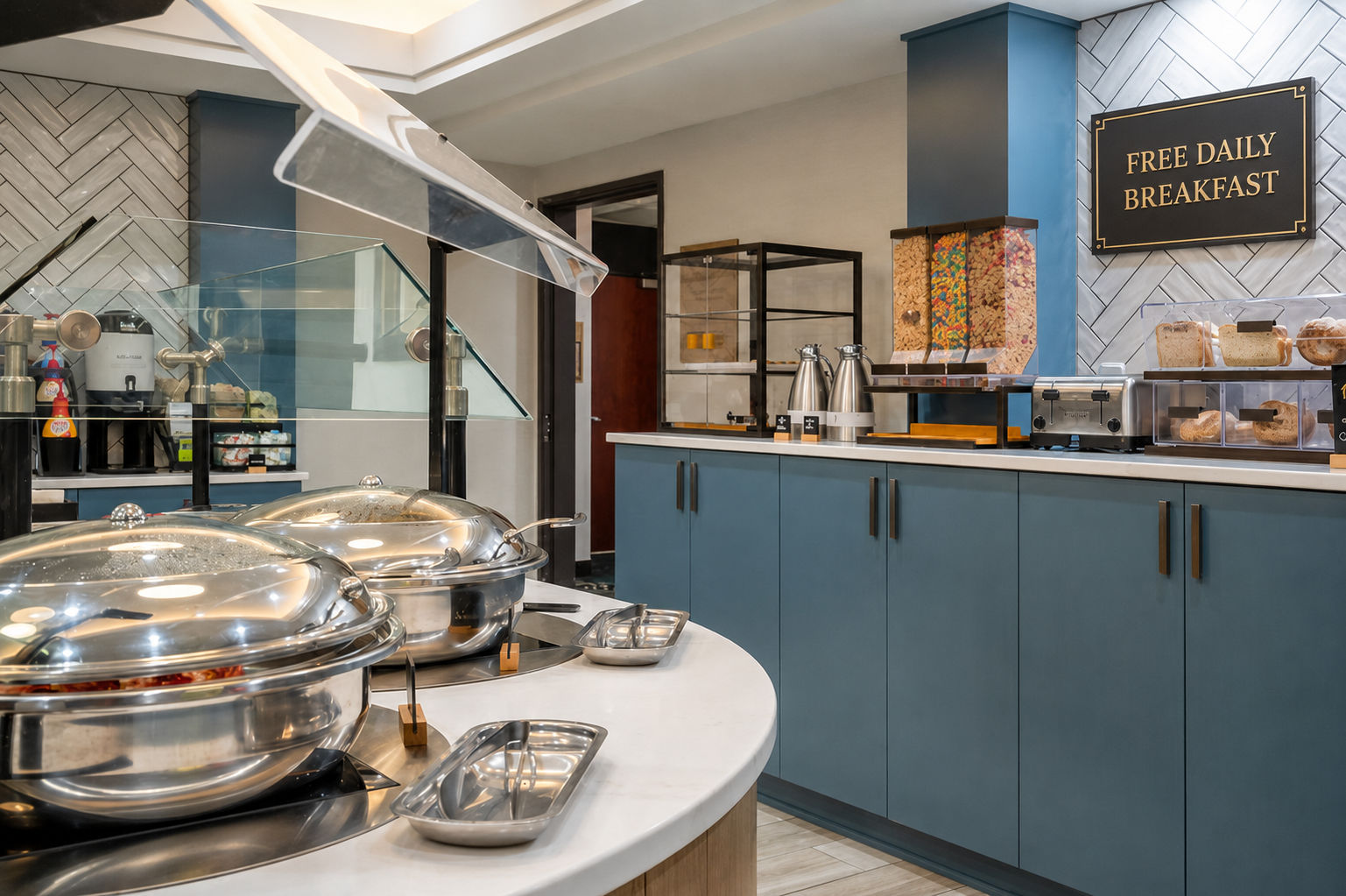 image Start your morning at the complimentary breakfast buffet, with hot dishes kept fresh in stainless chafing trays.