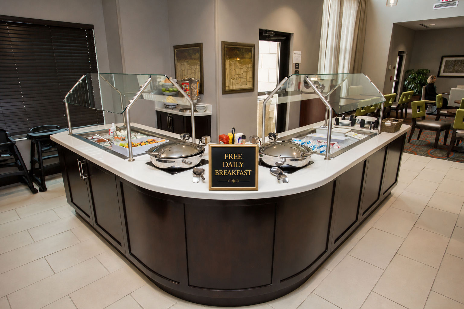 image Savor a delicious start to your day at the vibrant breakfast bar, filled with fresh options.