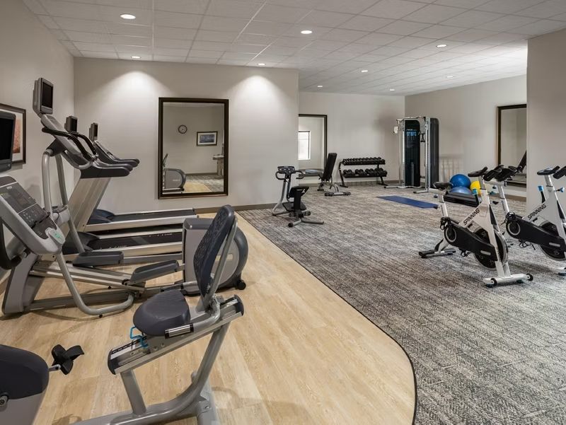image Break a sweat in a well-equipped fitness center outfitted for a full workout.