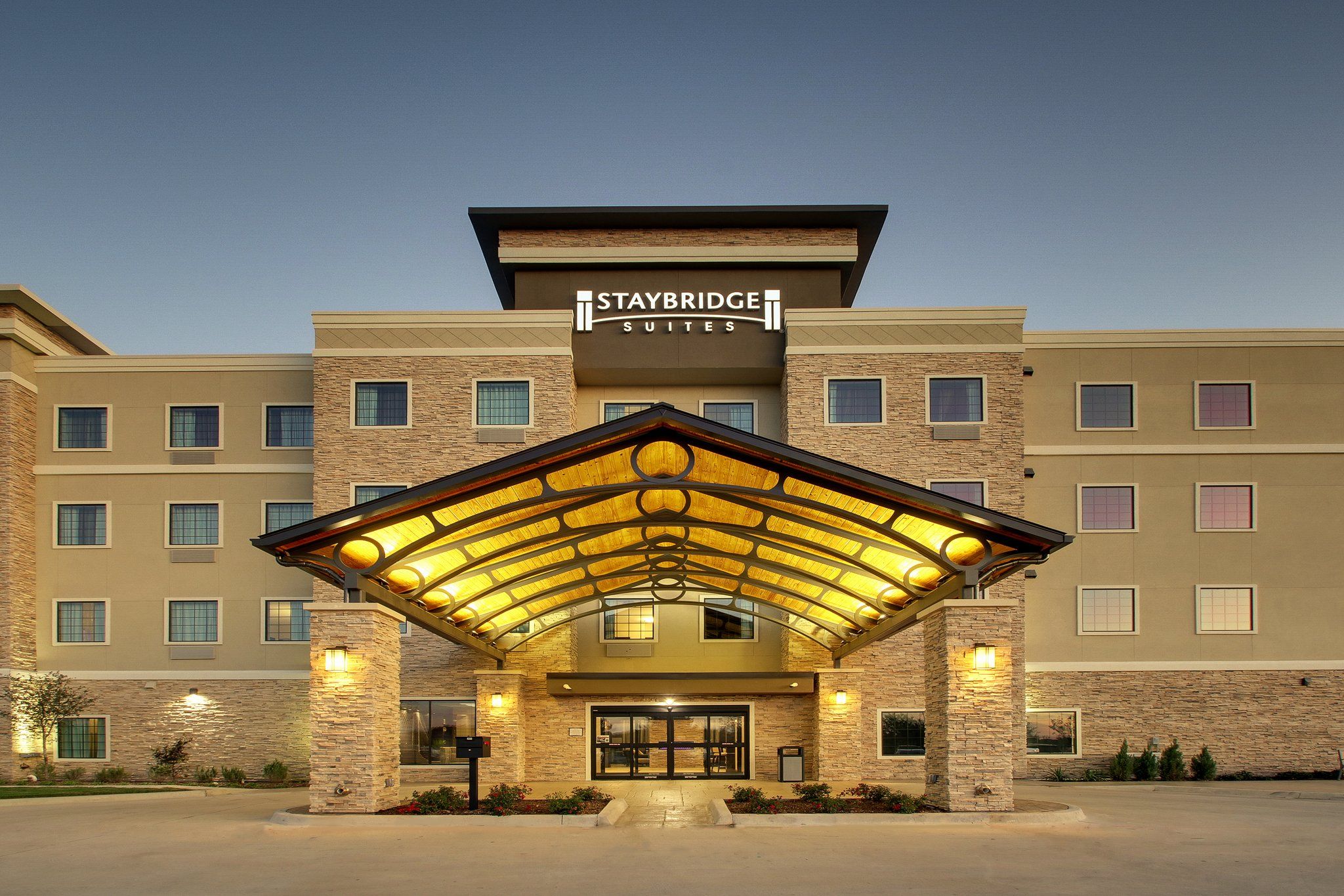 image Contemporary exterior with ample surface parking and easy access.