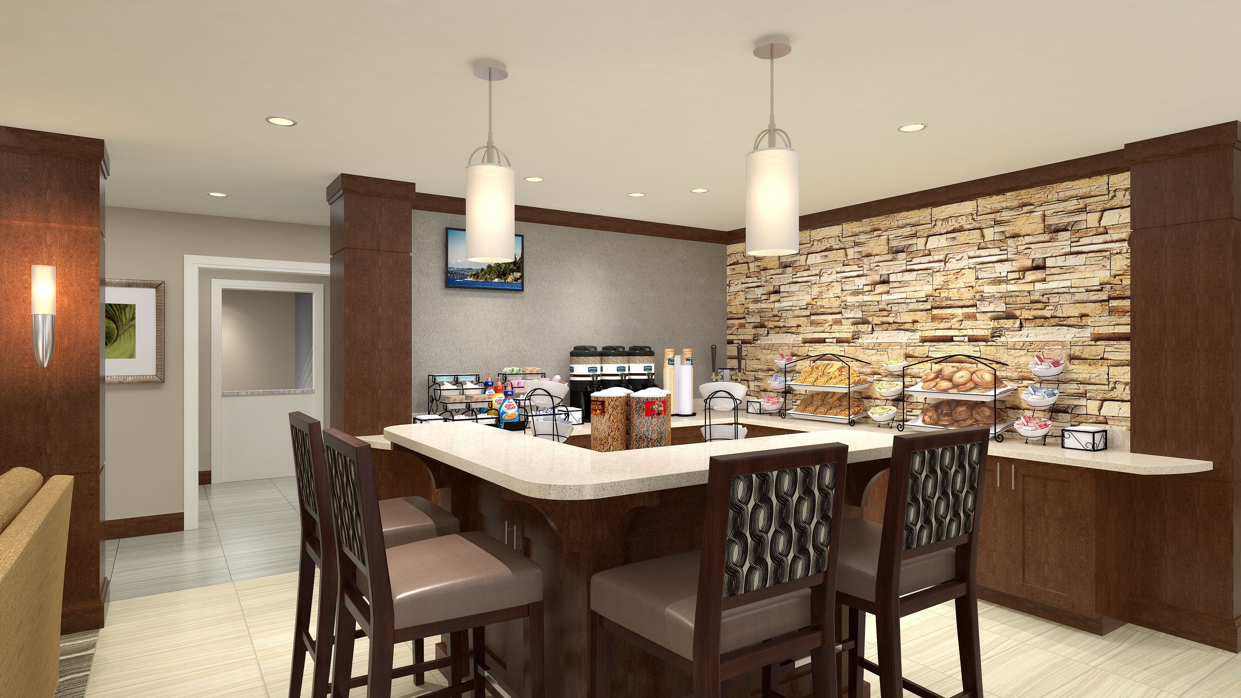image Complimentary breakfast area with seating and food options.