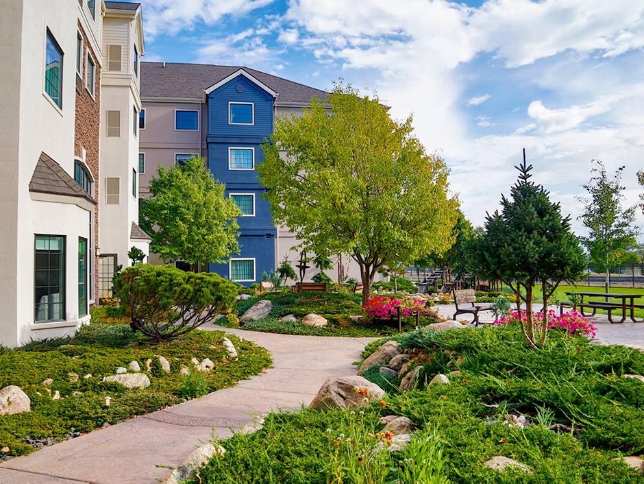image Stroll through vibrant gardens, where colorful flowers add charm to your path.