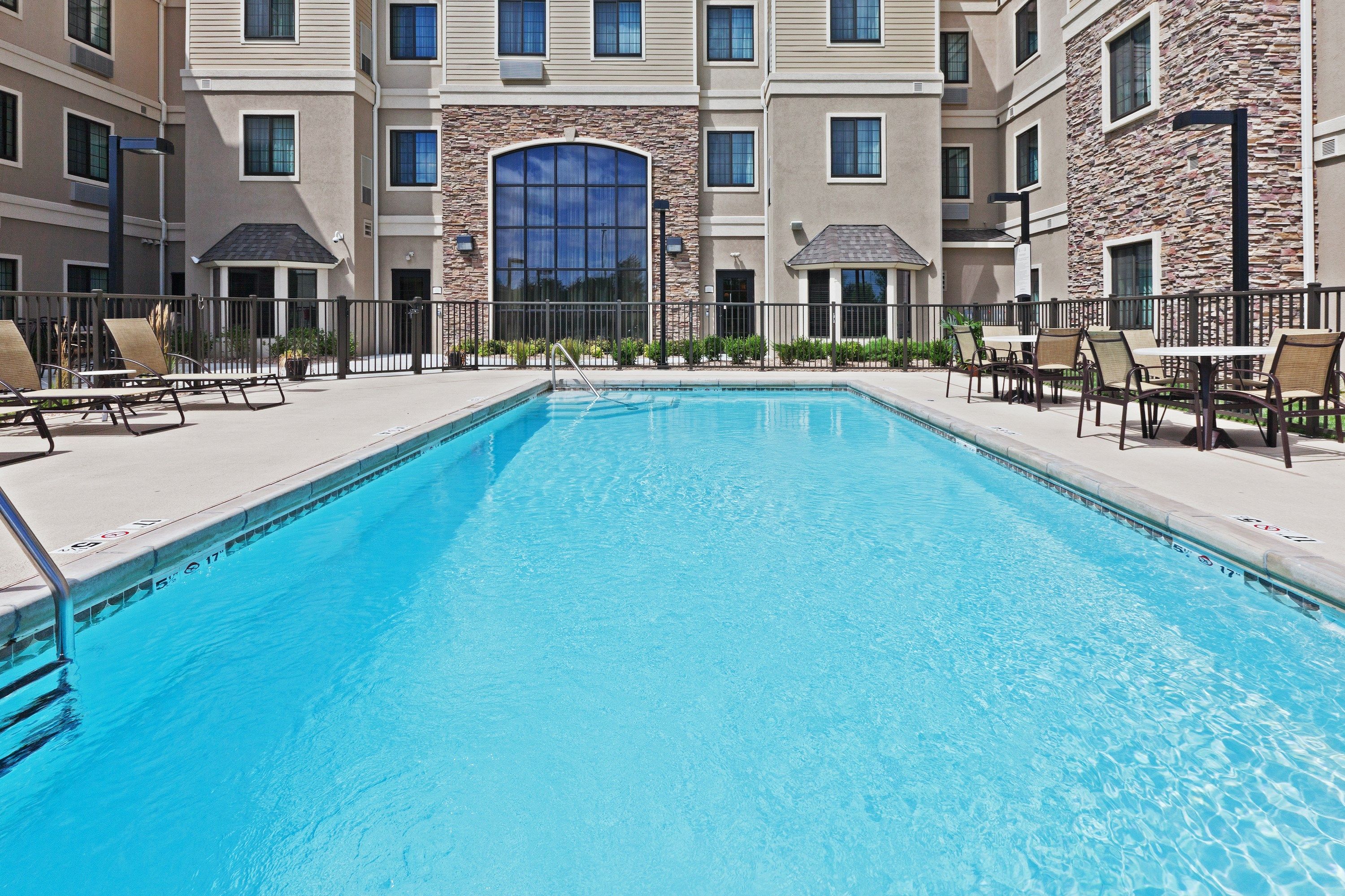 image Dive into the pool after a day of fun.