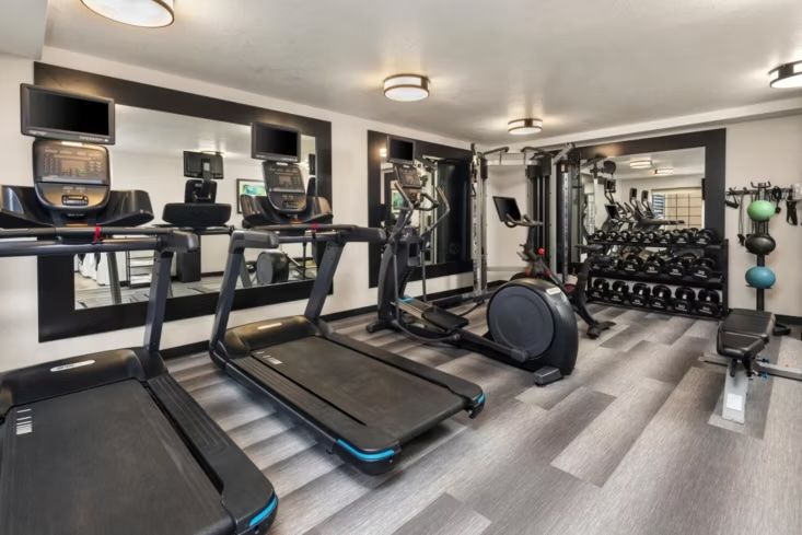 image Keep up your routine in the 24-hour fitness center, stocked with cardio machines and free weights