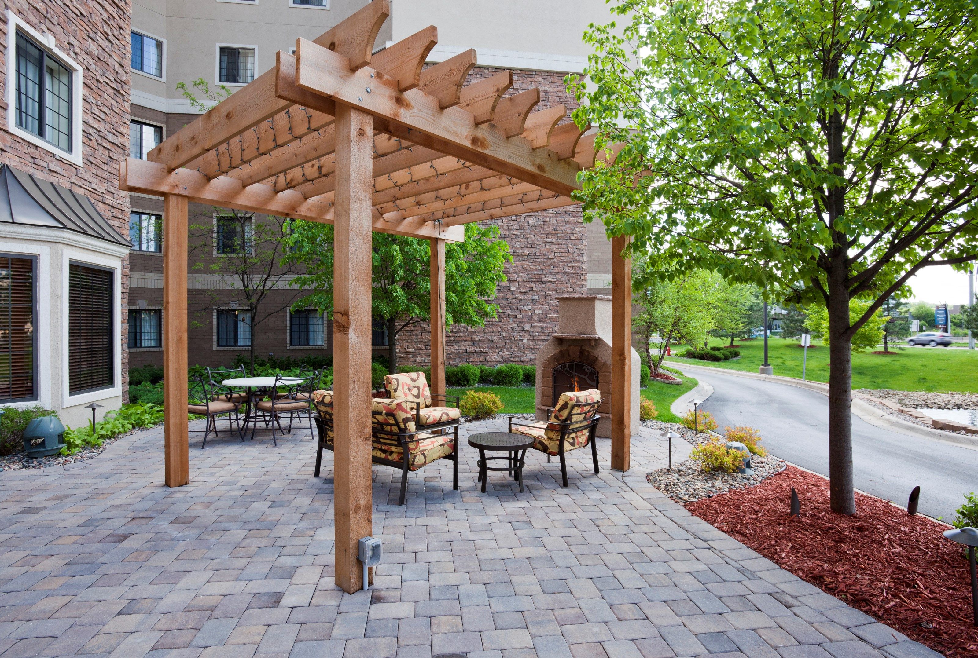image Stone fire pit surrounded by low seating — a quiet spot to wind down after a day out