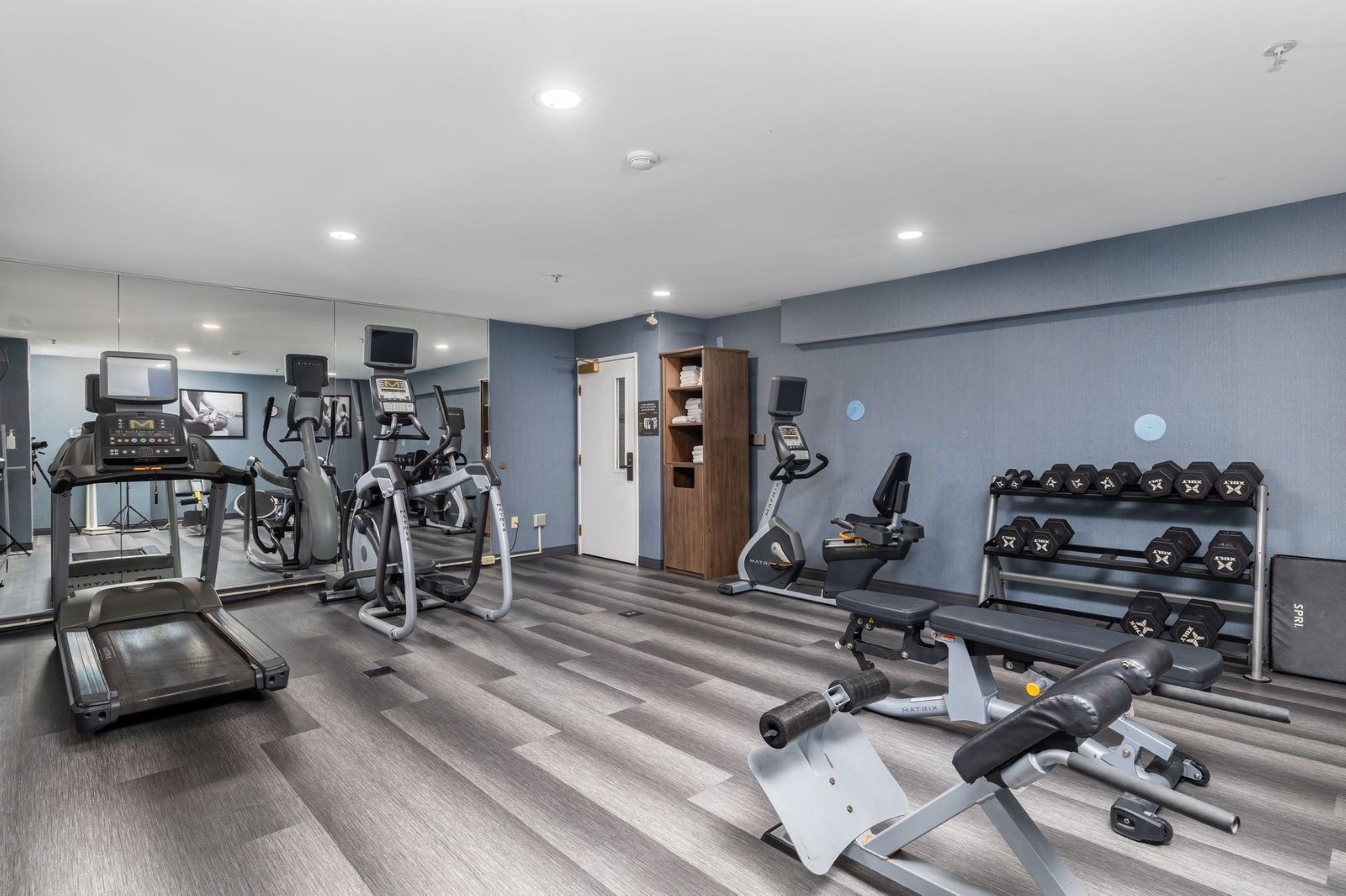 image Stay on track in the 24-hour fitness center with cardio and strength equipment