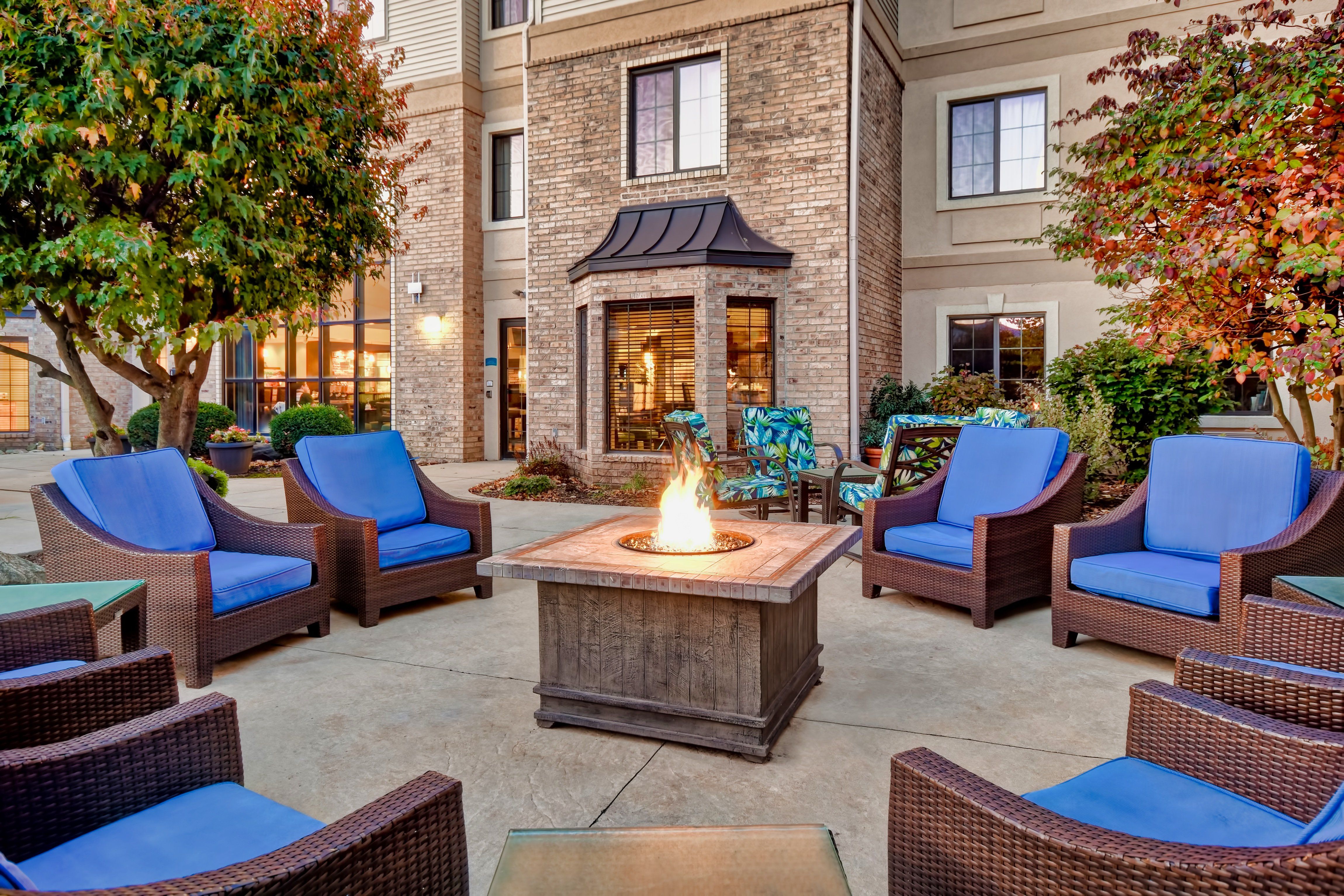 image Gather around the outdoor fire pit in the courtyard — ideal for evening socials