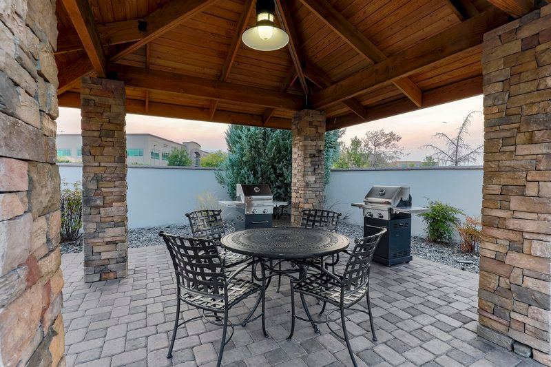 image Use our outdoor grills and enjoy a meal at our patio tables.