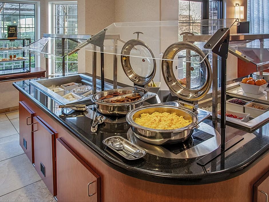 image Savor a hearty breakfast with an array of choices, all set for you to enjoy.