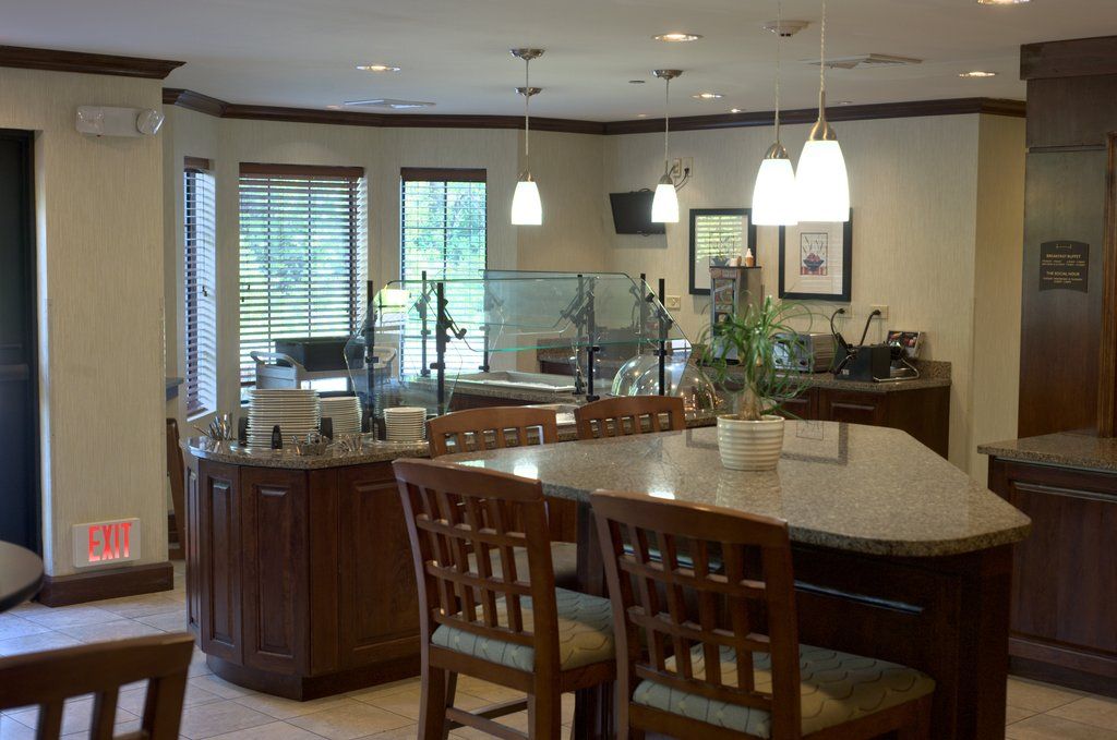 image Start your day right in a welcoming breakfast area filled with natural light.