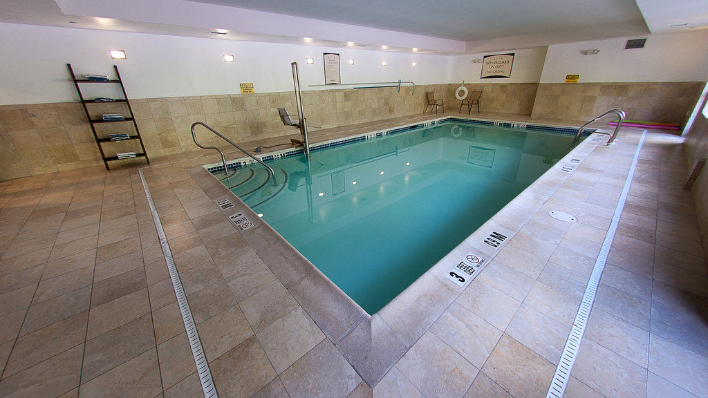 image Plunge into relaxation in a tranquil indoor swimming pool.