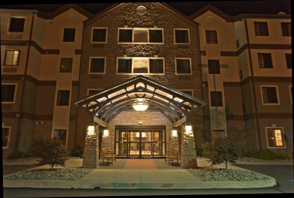 image Step beneath the welcoming archway, where warmth and comfort greet you at the entrance.