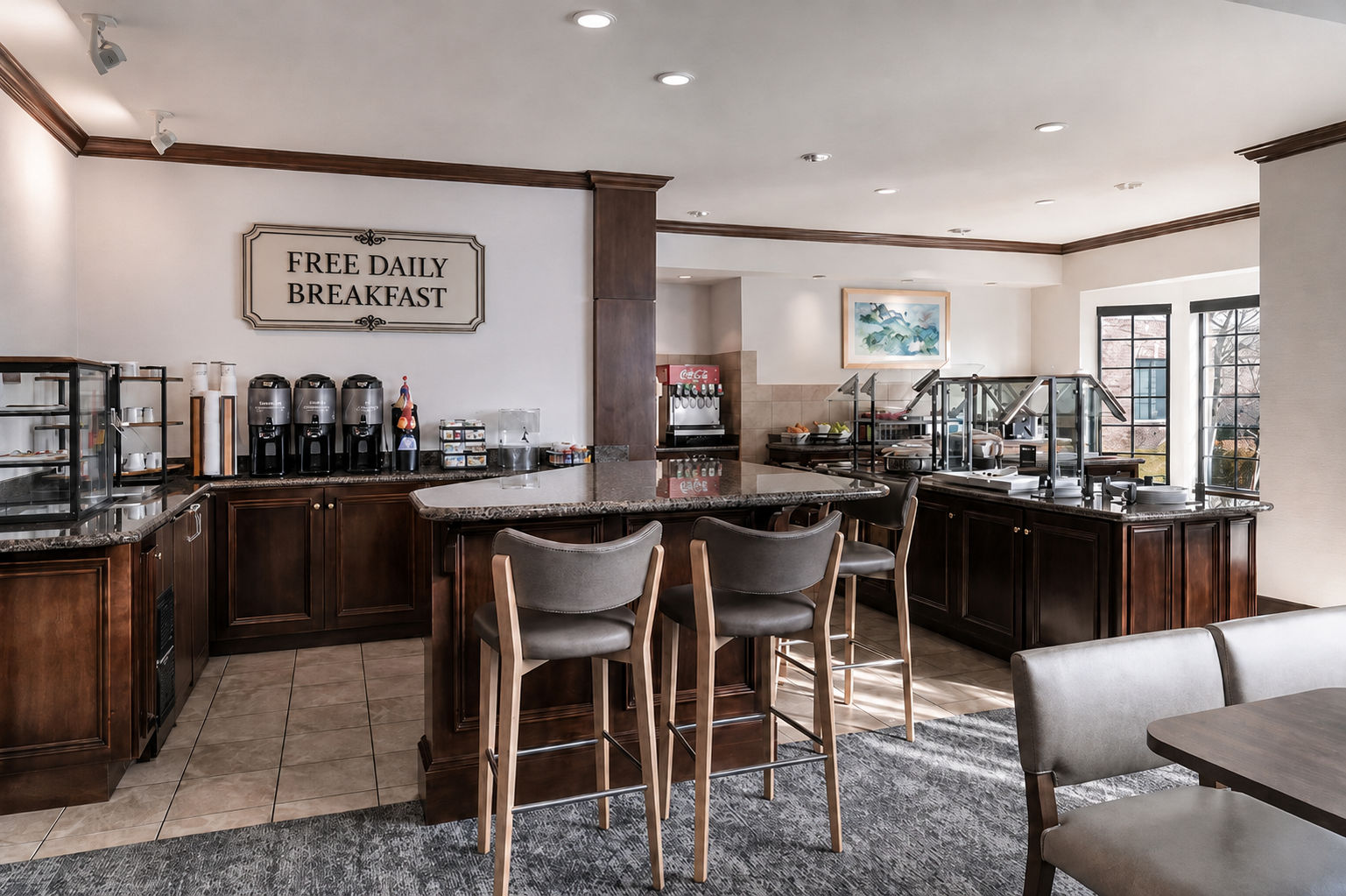 image Breakfast buffet with hot dishes, fresh fruit, and coffee — complimentary for all guests Mon–Fri
