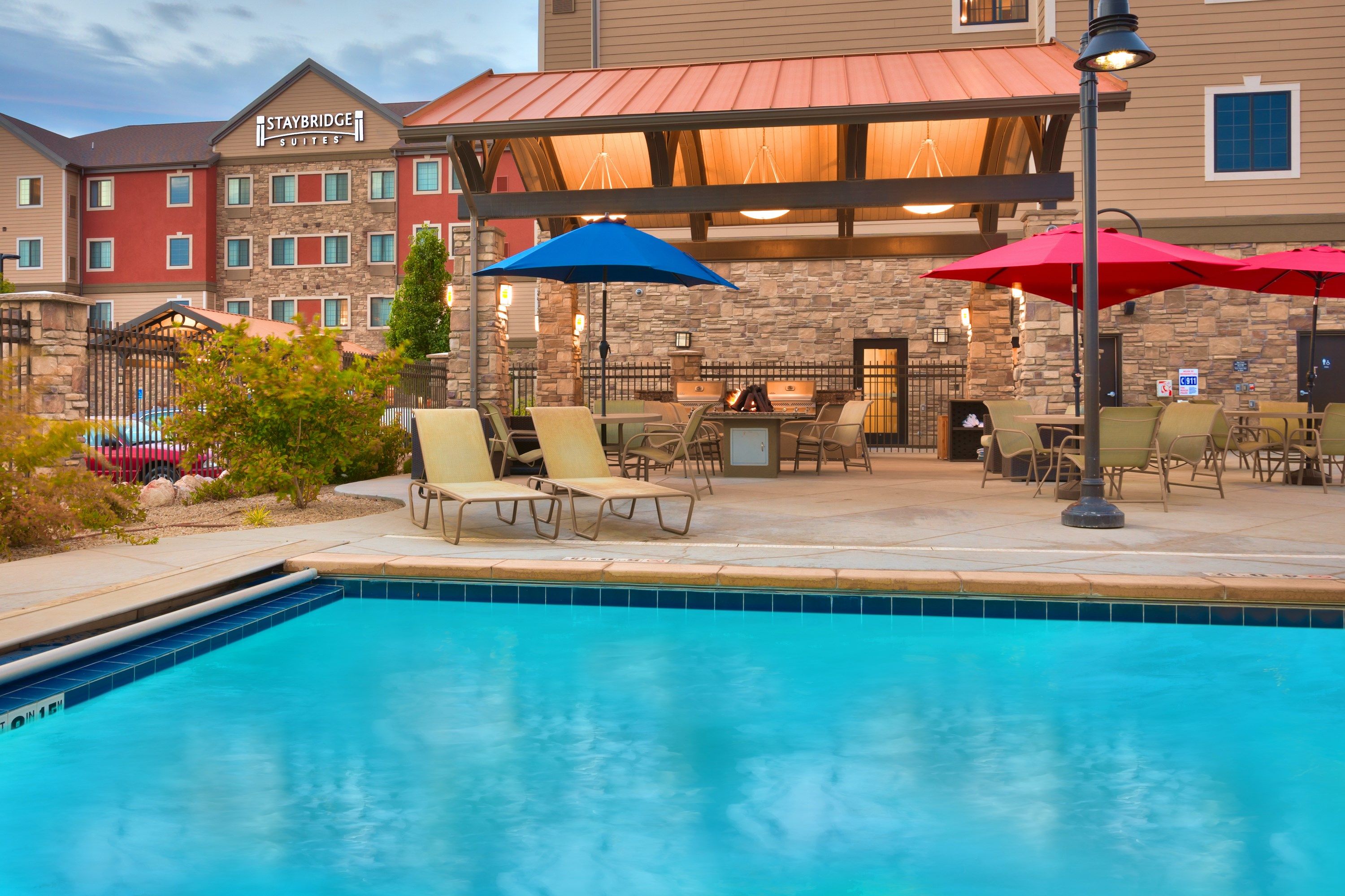 image Relax by the shared outdoor pool.