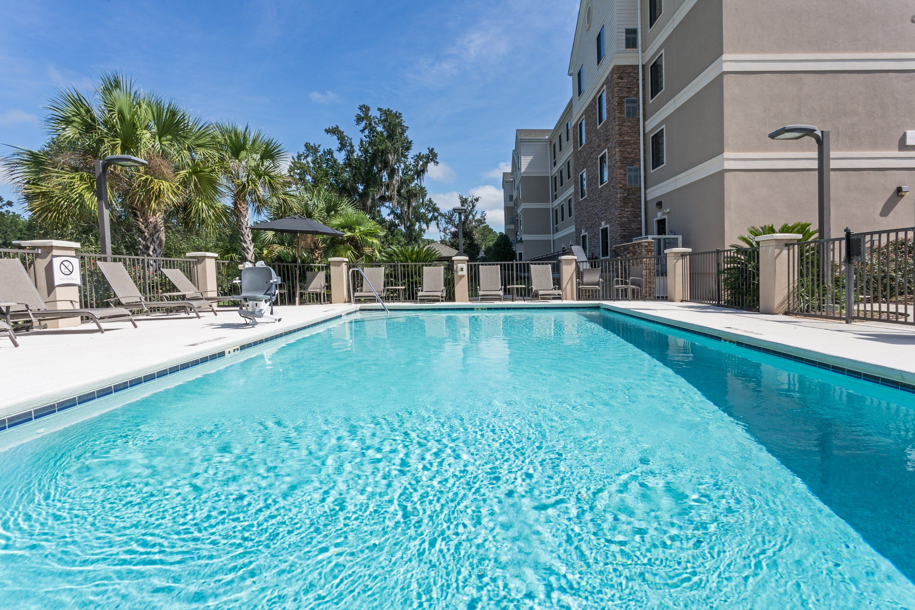 image Soak up the sun by the outdoor seasonal pool.