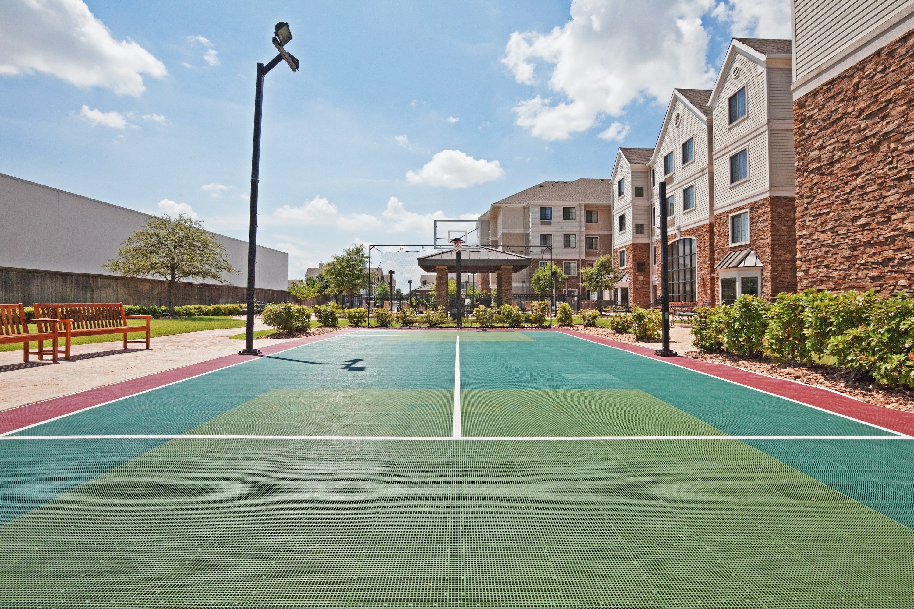 image Outdoor sport court with bench seating