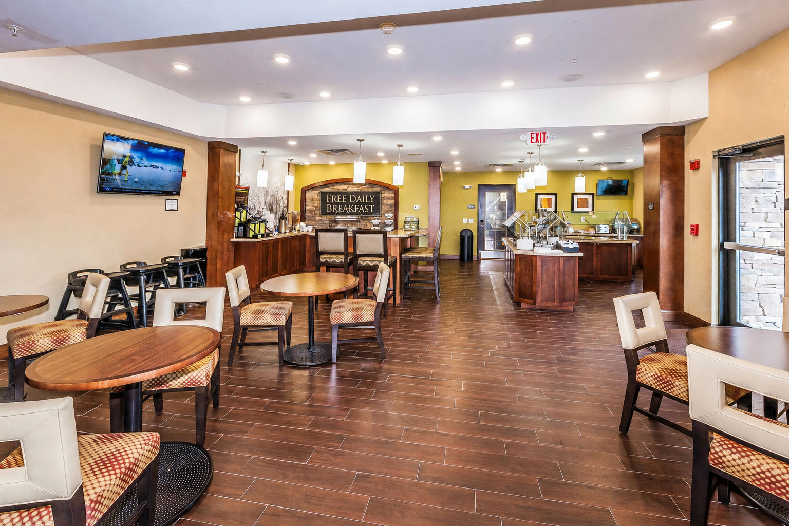 image Dining area where the complimentary breakfast buffet is served daily — hot and cold options every morning