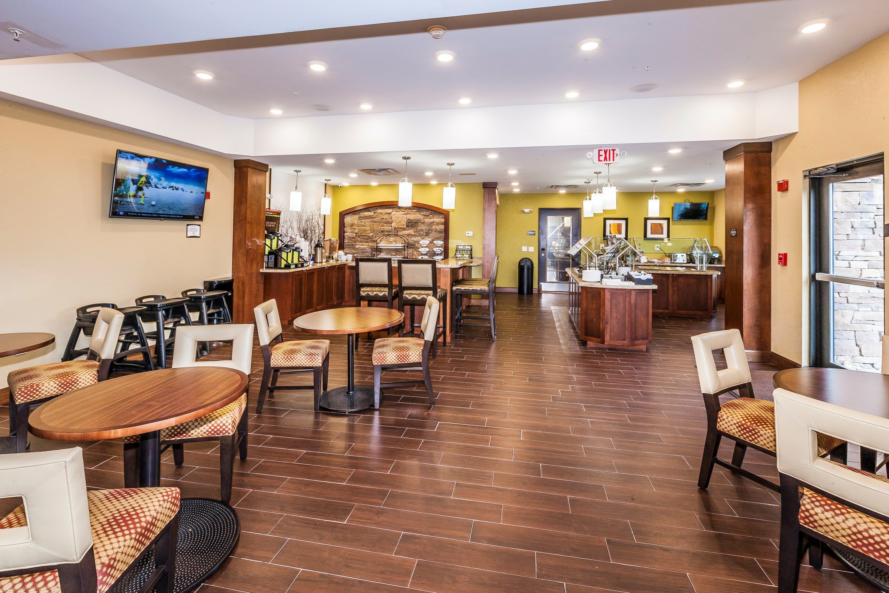 image Dining area where the complimentary breakfast buffet is served daily — hot and cold options every morning