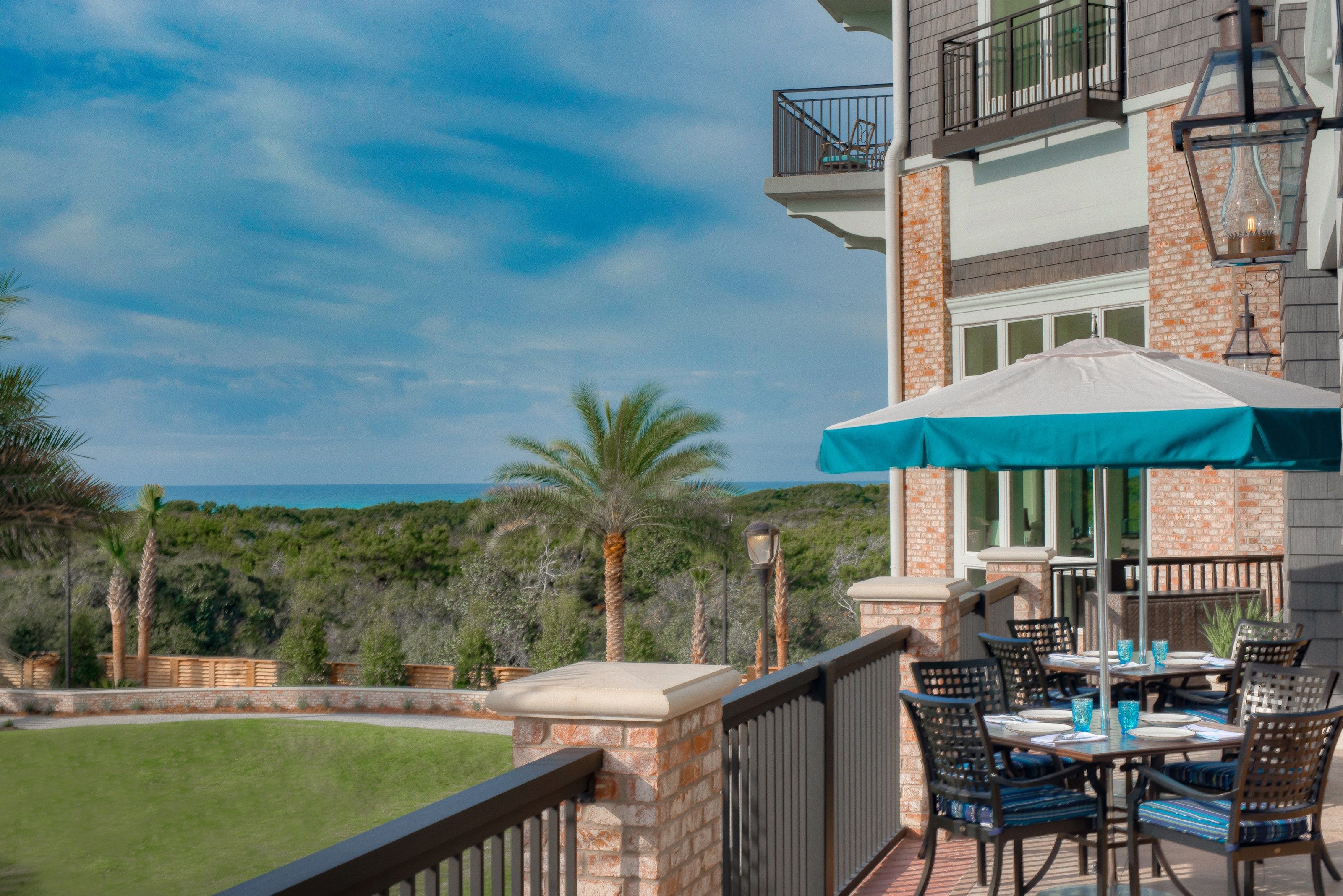 image Outdoor seating at the property with a view, ideal for dining or simply enjoying the scenery.
