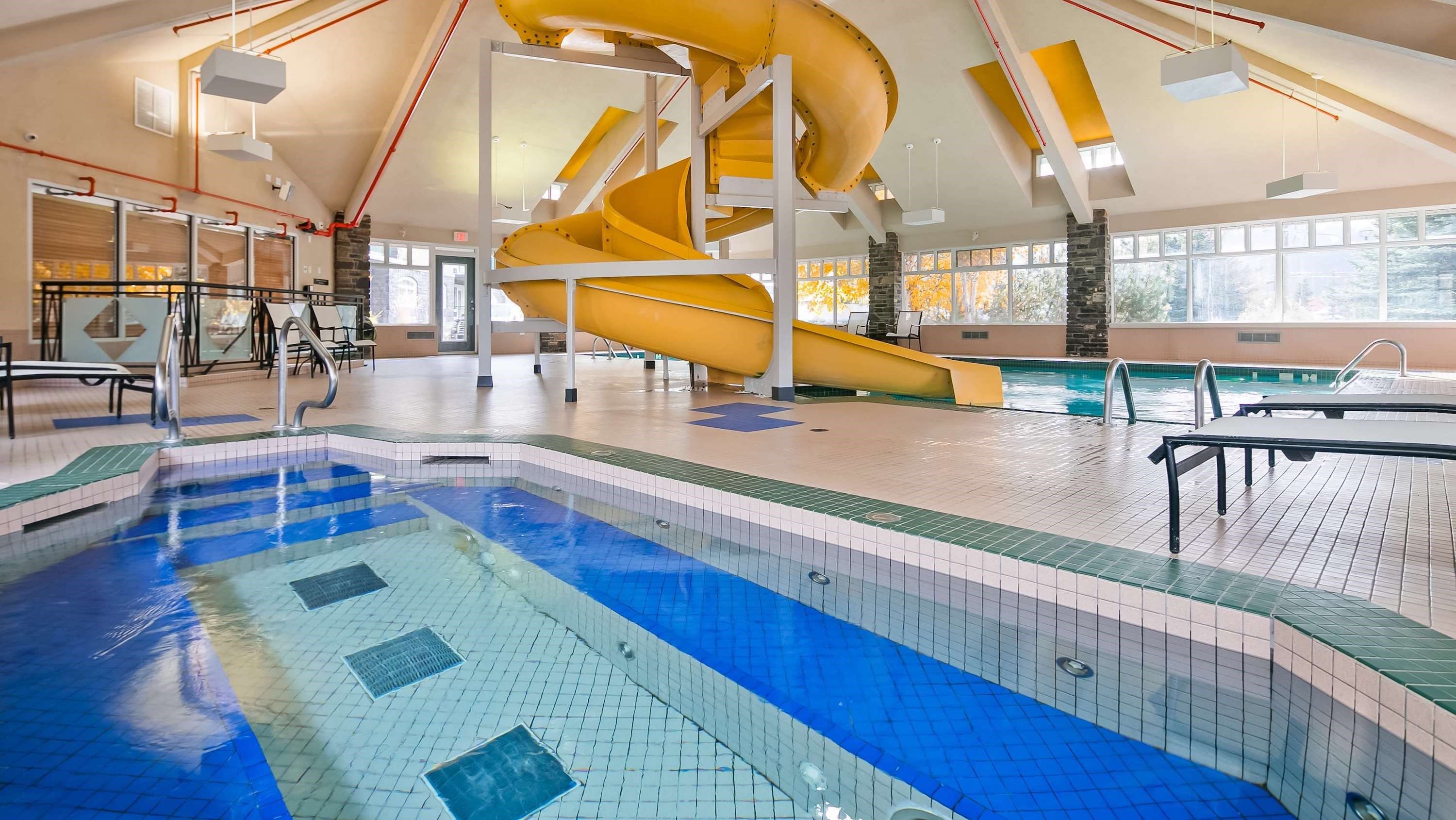 image Enjoy the fantastic pool area with waterslide and hot tub!