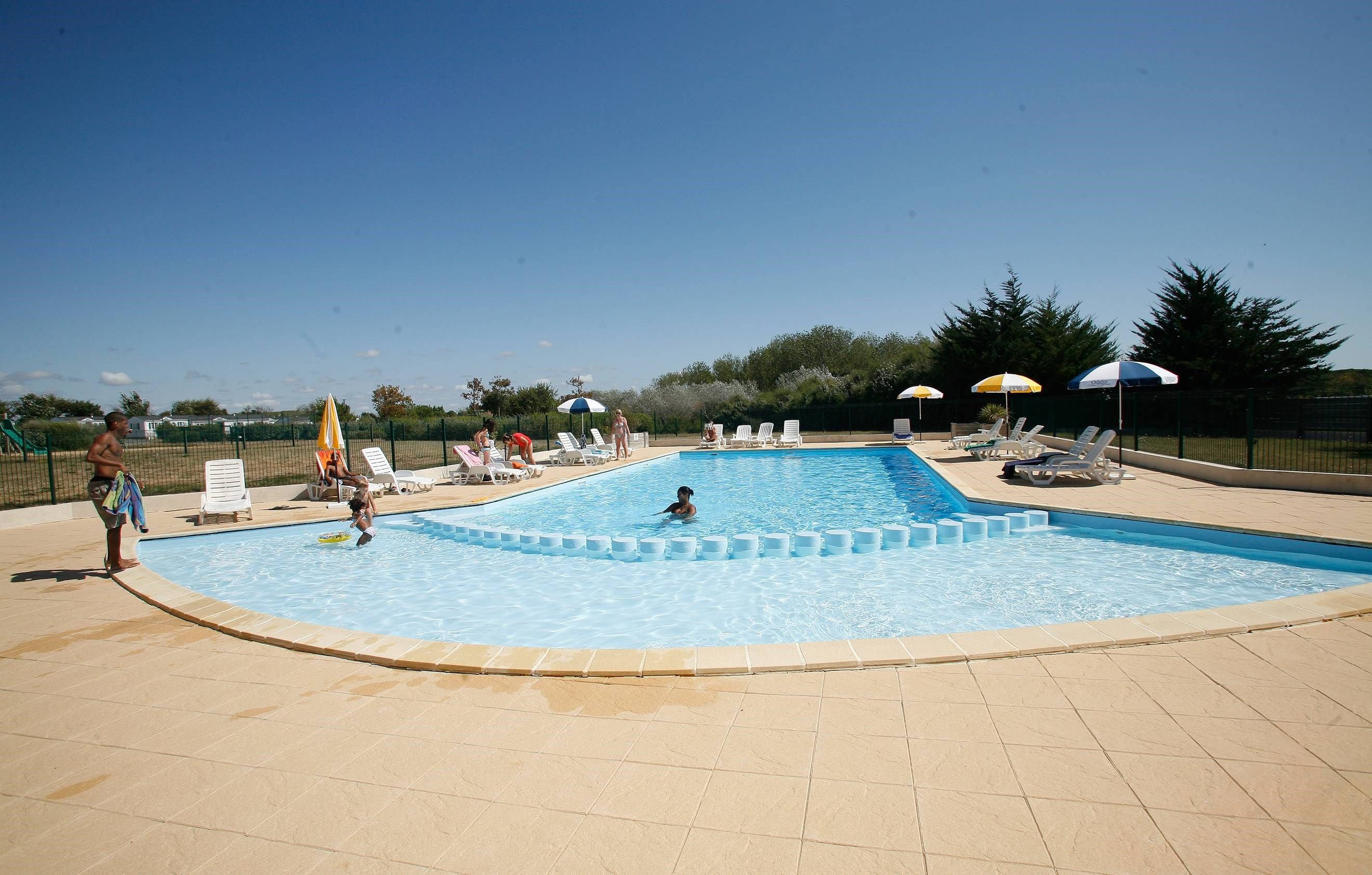 image Dive into the lovely outdoor pool, open from May to September!