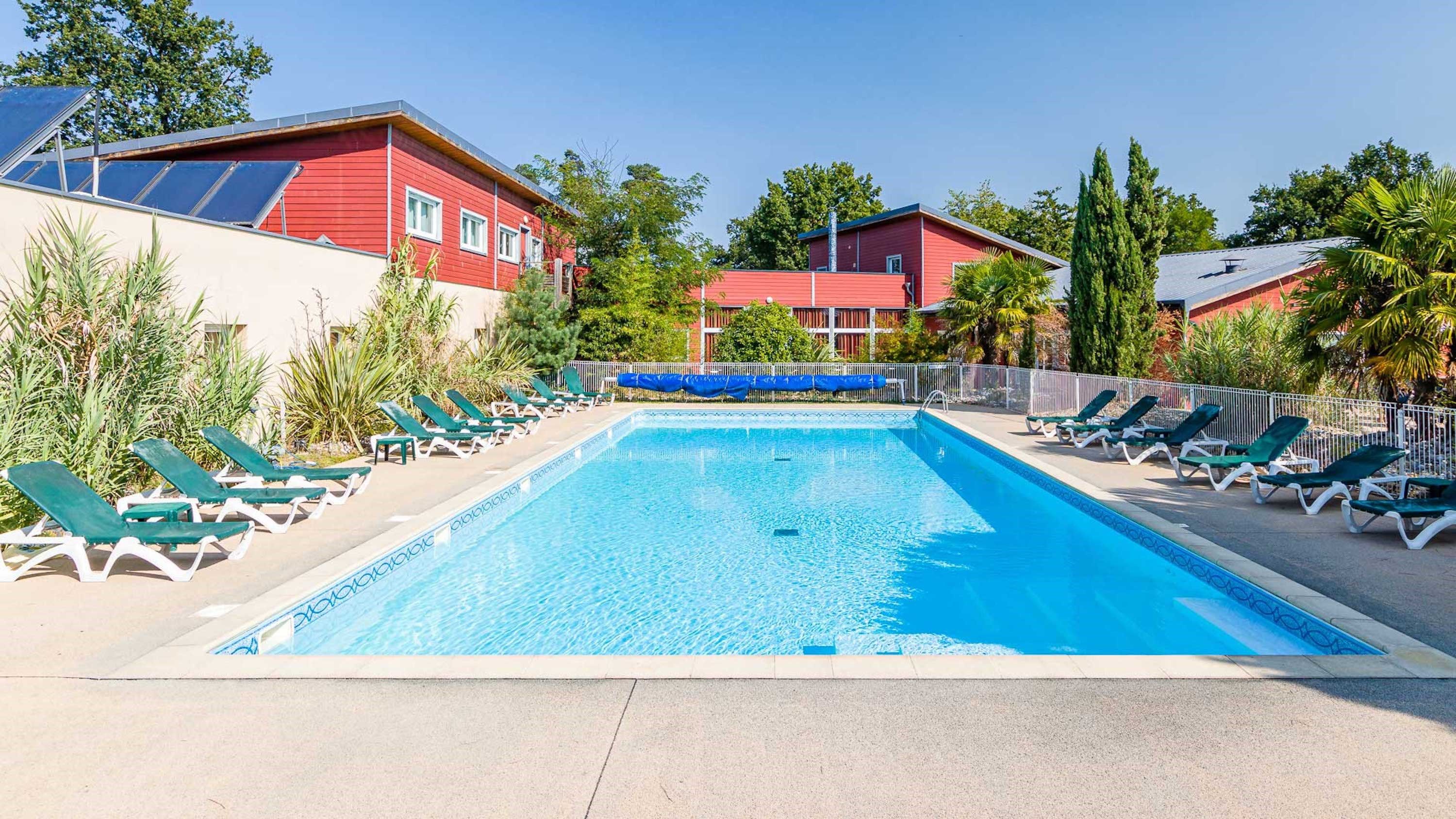 image Relax by the shared outdoor pool!