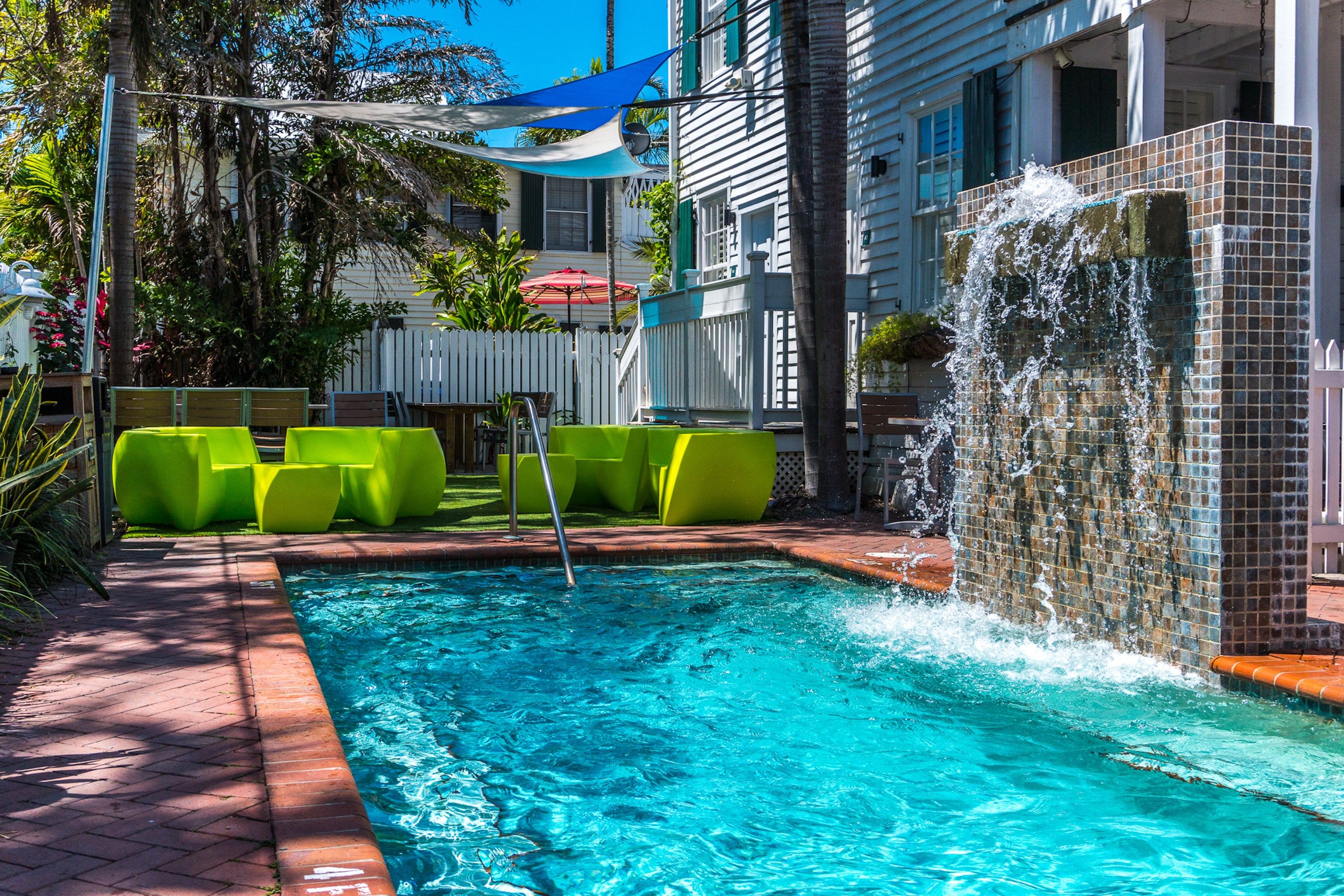 image Relax in the shared outdoor pool.