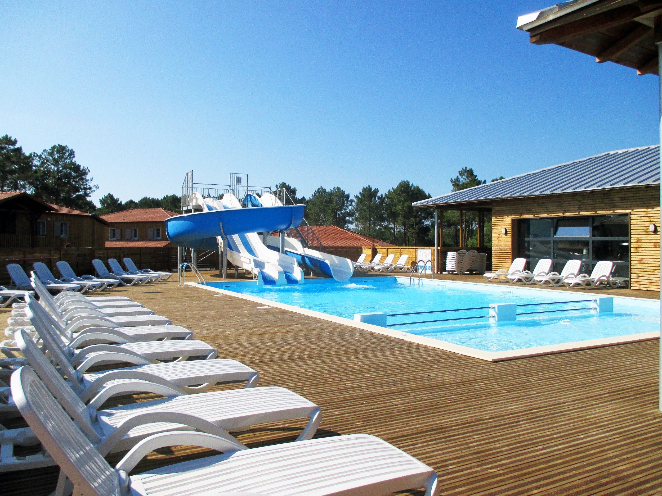 image Lounge by the pool in the sunshine.Take a dip in the outdoor pool.