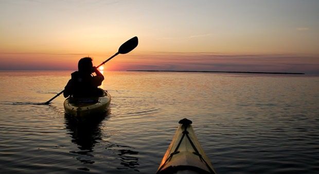 image Paddle into the calm waters of Currituck Sound — kayaks are available right at the resort