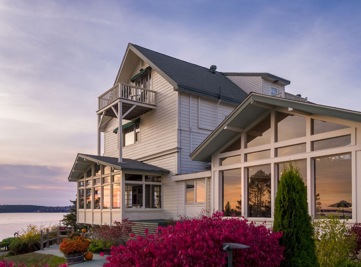 image Feel instantly at ease as soft evening light washes over this tranquil coastal retreat.