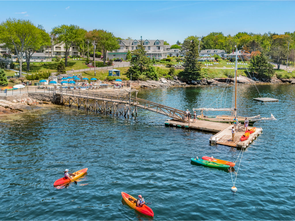 image Paddle through sparkling waters and vibrant harbor life for a day full of fresh air and free-spirited fun.