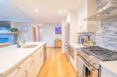 Cook up a storm in this inviting kitchen featuring modern appliances and ample counter space.