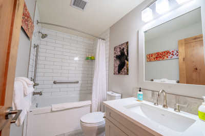 A bright, elegant bathroom awaits, designed for your comfort with modern finishes.