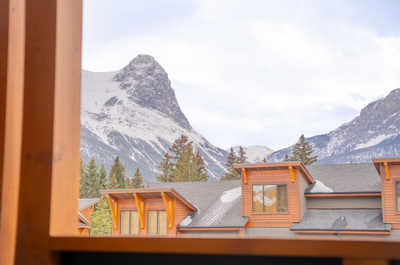 Gaze out at the majestic mountains, a stunning backdrop to your cozy retreat.