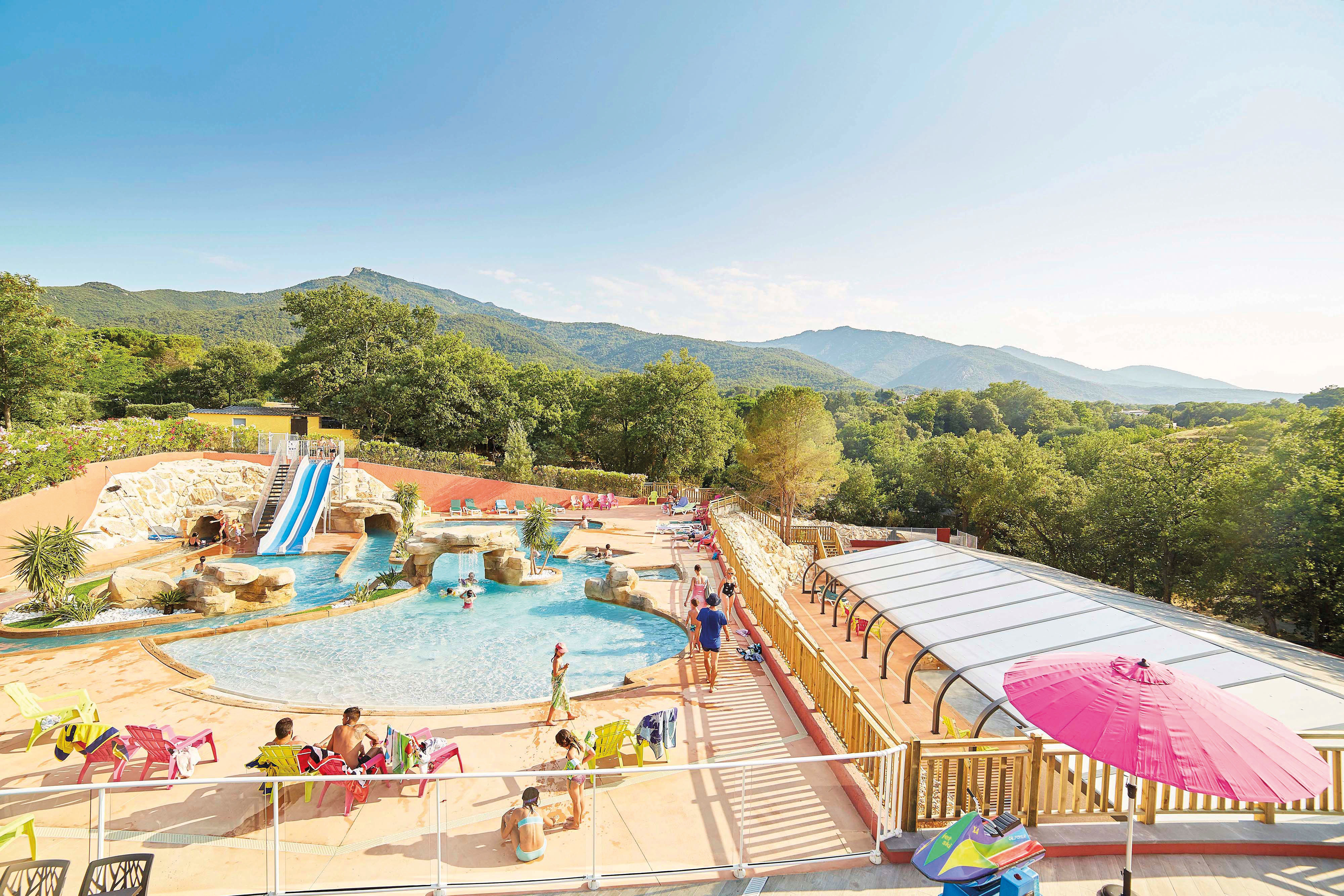 image Large water park area surrounded by nature, offering endless activities for guests.