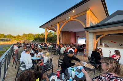 Guests gather for an outdoor event.