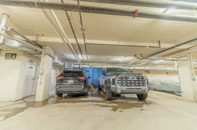 Underground parking space for two vehicles and storage areas
