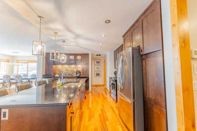 Kitchen with island counter and pendant lighting