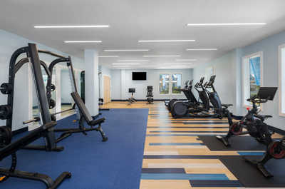 Elevate your workout experience in a bright and modern fitness space.