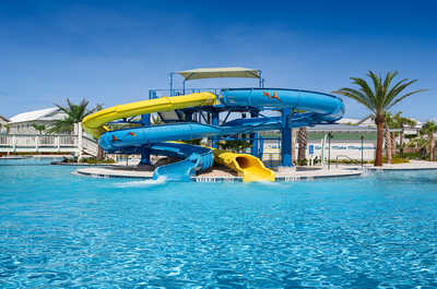 Family fun awaits in our vibrant pool with water slides.