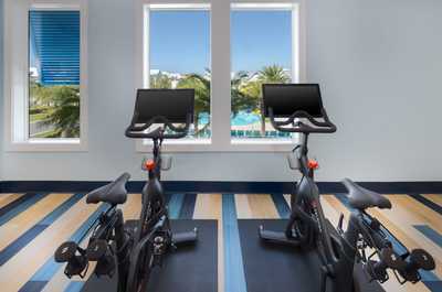 Stay active with a view! Enjoy workouts next to sunny poolside moments.