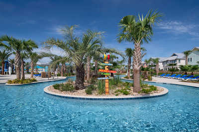 Experience relaxation surrounded by palm trees in our lagoon-like pool.